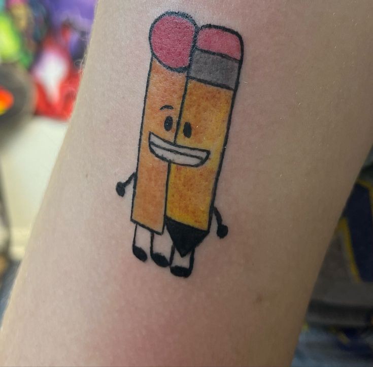 pencil and match tattooed onto someones arm